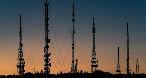 Radio towers at sunset