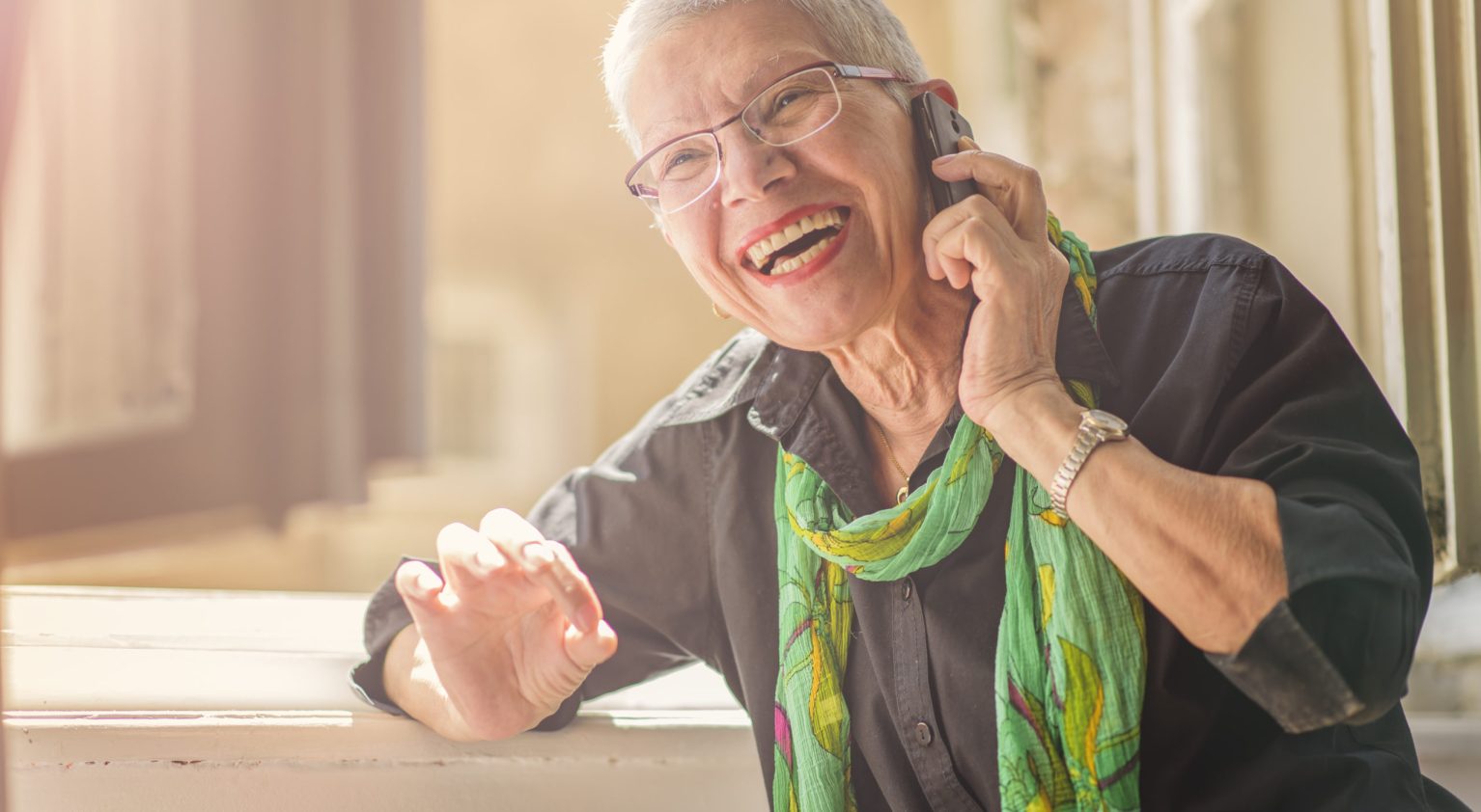 Elderly woman on mobile phone